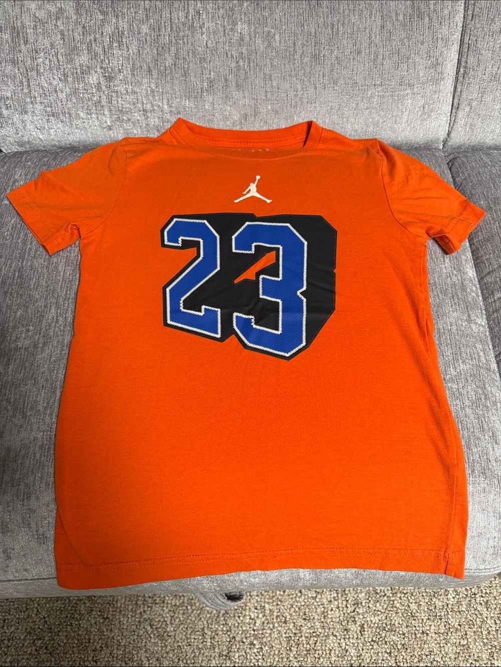 Jordan Orange Short Sleeve Tee with Blue & Black 23 Graphic